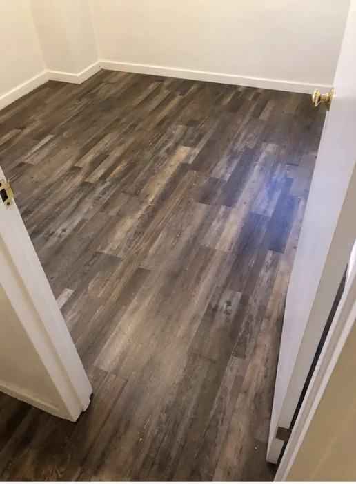 Installed vinyl plank flooring in a finished room